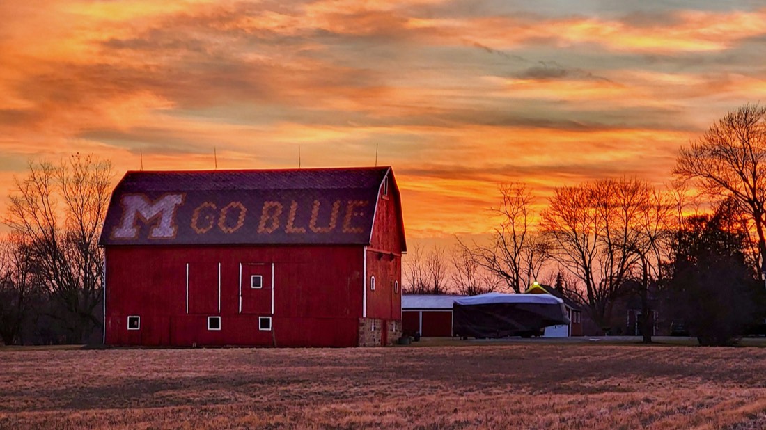 The Go Blue barn outside Ann Arbor at sunset